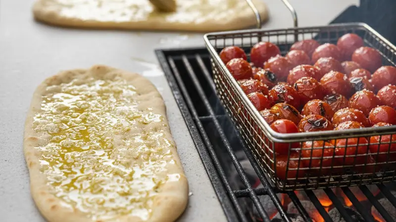 Grill tomatoes and flatbreads