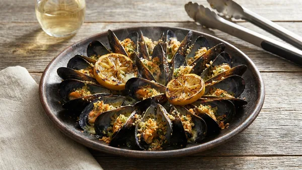 Smoky Grilled Mussels with Charred Lemon, Garlic-Butter and Herb Breadcrumbs