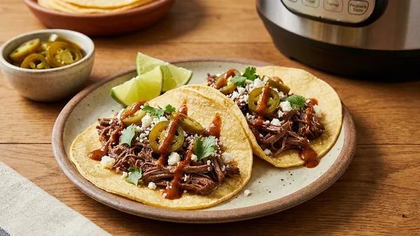 Instant Pot Beef Barbacoa Tacos with Warm Corn Tortillas and Pickled Jalapeños