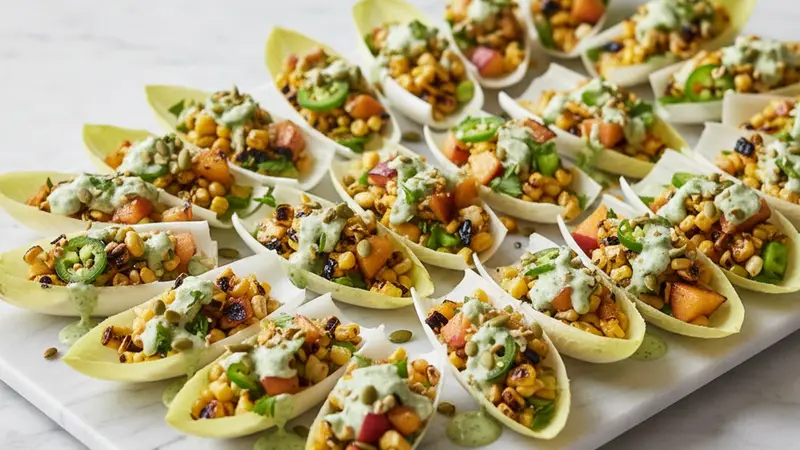 Labor Day Grilled Corn-and-Peach Endive Bites with Cilantro-Lime Crema